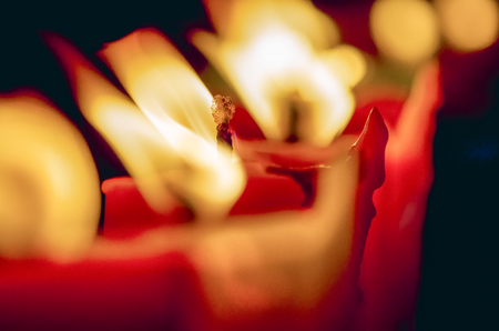 Candles light at night, Abstract glowing background, Close up and selective focusの写真素材