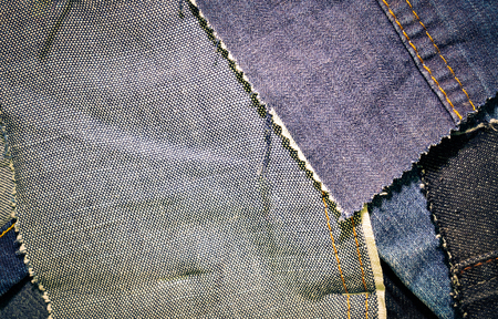 Texture of blue jeans textile close upの写真素材