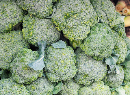 Green Organic Raw Broccoli at the local farmers marketの写真素材