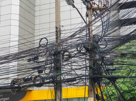 Save Download Preview BANGKOK: August 23: The chaos of cables and wires on asoke road on August 23, 2016 in Bangkok, Thailand.のeditorial素材