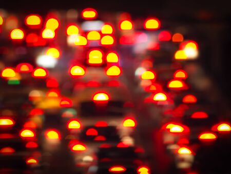Photo technique image/ Abstract colorful blur de focused of yellow and red Tail lights of cars on the road background, Night lights art conceptの写真素材