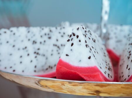 Retro color/ Selective focus of Sliced dragon fruit with place your text (Tropical fruit)の写真素材