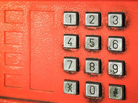 Old button number public telephone, Close up image with place your textの写真素材