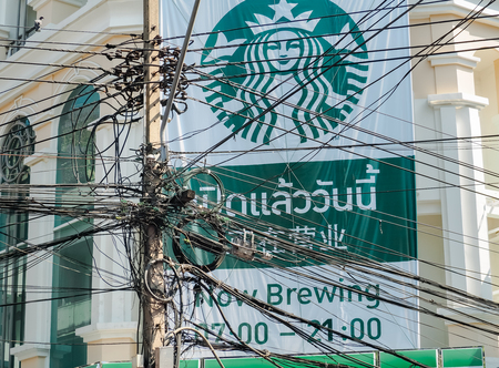 BANGKOK: January 11: The Chaos of Cables and Wires Located on Starbucks Coffee Shop in Chinatown on JANUARY 11, 2017 in Bangkok, Thailand.のeditorial素材