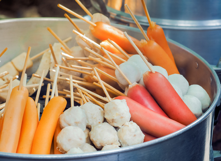 Sausage sticks and various meatballs sticks made from pork, fish, chicken, beef, Thai fast foodの写真素材