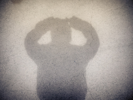 Retro color/ Shadow of a children on street concrete background/ Abstract imageの写真素材