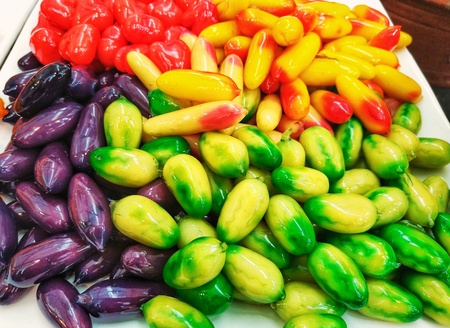 Deletable imitation fruits (kanom Look Choup) ,Thai dessert made from soybean crushing sugar and jelly. Dessert of Thailandの写真素材