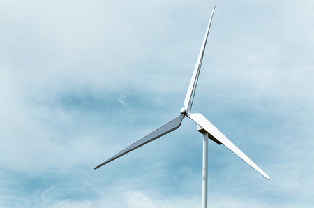 Wind turbine generating electricity on blue sky, With place your text.の写真素材