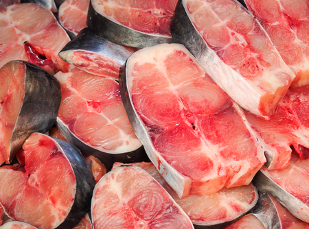 Close up of fresh Fish sliced sold in seafood market.