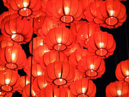 Red lanterns in the darkness, Japanese or Chinese lanterns.の写真素材