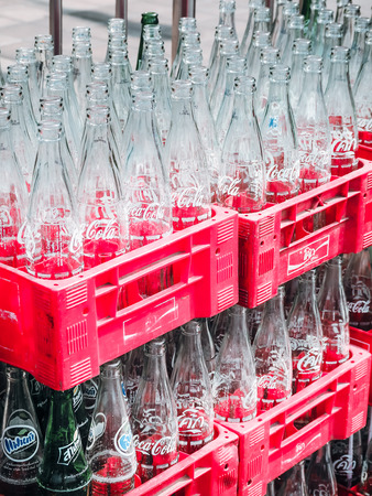 BANGKOK, THAILAND - FEBRUARY 26: Empty recycle bottles of Coca Cola in red plastic box on February 2, 2018 in Bangkok, Thailand. Coca Cola drinks are produced and manufactured by The Coca-Cola Companyのeditorial素材