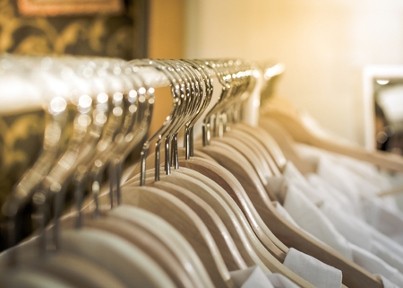 Group of silver clothes hangers. Fashion concept imageの写真素材