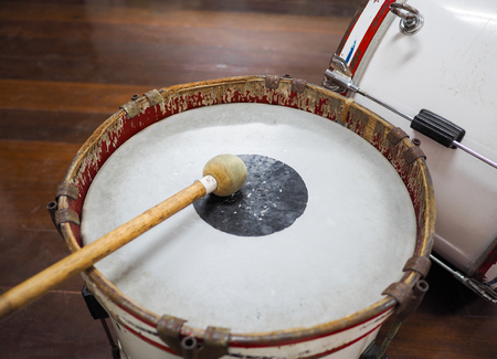 Retro percussion musical instrument. Military drum (Bass drum) with drum sticks.の写真素材