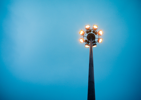 Luminaire ring with orange lighting fixtures, With space for place your text.の写真素材