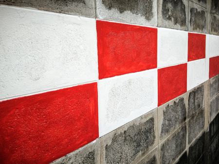 Red and White Paint on the Wall Brick Background. Textured and Background image.の写真素材