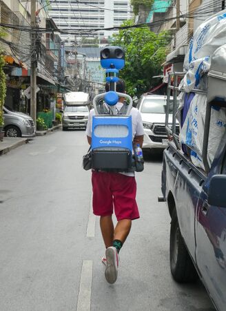 BANGKOK, THAILAND - May 16, 2019: Officials survey from Google company used hi-tech machine by walking for Street View survey, On duty to determine the GPS satellite in street and alley for Google map application.のeditorial素材