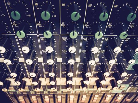Sound equalizer mixing. Professional studio equipment for sound mixing. Music studio image.の写真素材