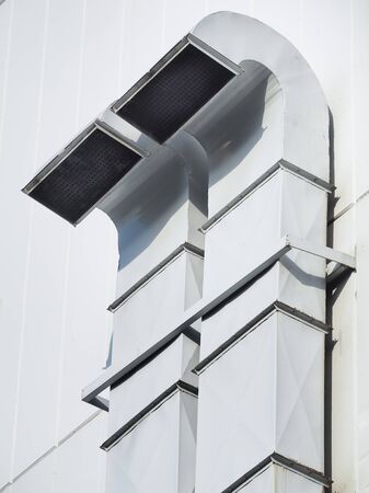Ventilation and air conditioning pipe installed outside the building. Ventilation tube for...