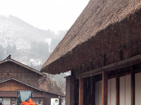 Shirakawa-go, Japan - March 11, 2019: Traditional gassho-zukuri house in shirakawa-go on a rainy day. Shirakawa-go is one of Japan`s World Heritage Sites located in Gifu Prefecture, Japan.のeditorial素材