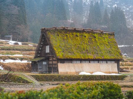 Shirakawa-go, Japan - March 11, 2019: Traditional gassho-zukuri house in shirakawa-go on a rainy day. Shirakawa-go is one of Japan`s World Heritage Sites located in Gifu Prefecture, Japan.のeditorial素材