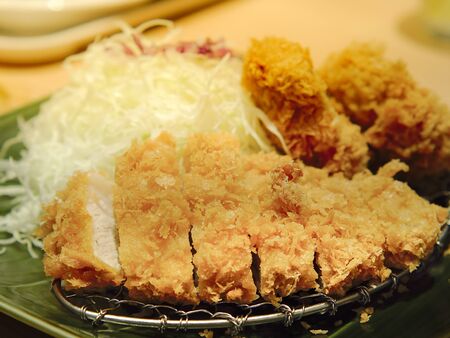 Pork tonkatsu steak, Fried pork and fried breaded served with shredded cabbage, Japanese food.の写真素材