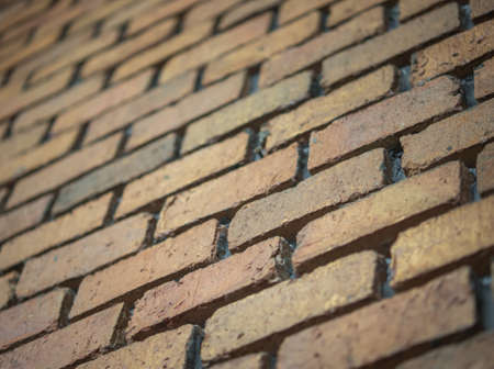 Old brick wall texture and background. Brickwork or stonework flooring interior for background. Selective focus.の写真素材