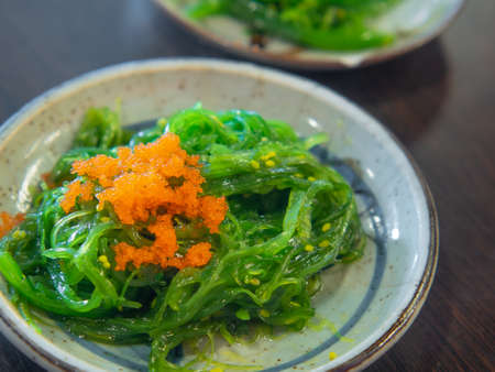 Hiyashi wakame chuka with shrimp eggs, Japanese seaweed with sesame.