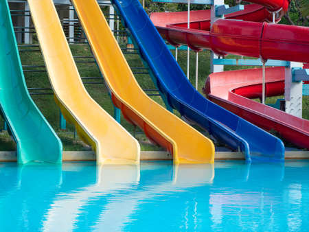 Colorful plastic water-slide in swimming pool or water park.の写真素材