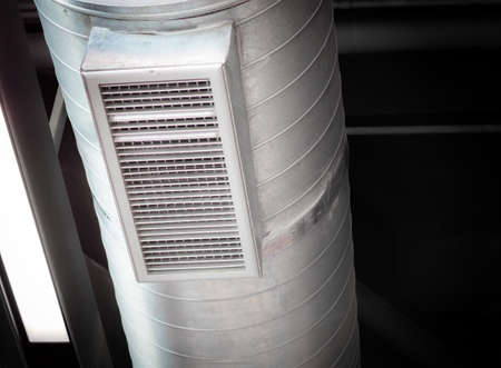 Air Ventilating tube installed on the ceiling of the office building or mall.の写真素材