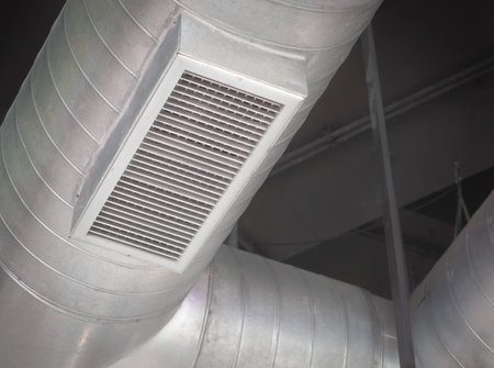 Air Ventilating tube installed on the ceiling of the office building or marketmall.の写真素材