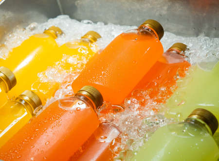 Fresh fruit juice orange juice guava juice and lemon juice into bottle on ice ready to drink.の写真素材