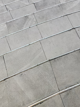 Cose-up of textured concrete stairs.