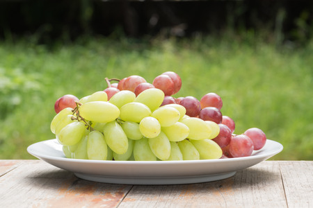 Fresh grape on dish ware