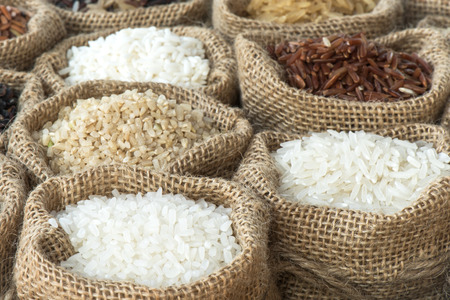 Group of organics rice in burlap bagの写真素材