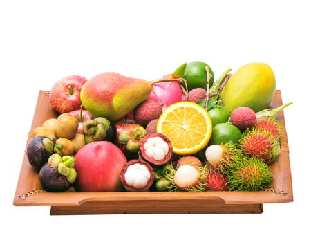 Group fruits on bamboo plate  isolated with clipping pathの写真素材