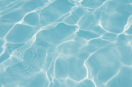 Blue water surface in swimming poolの写真素材