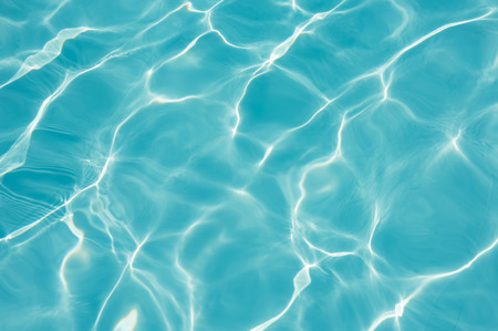 Blue water surface in swimming poolの写真素材