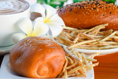 Sweet bun baking with French fries for breakfast