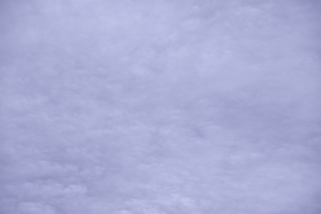 Abstract purple background composed of indistinct cloud shapesの写真素材