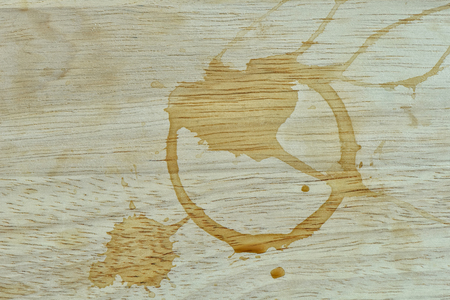 After coffe break with Coffee stains on the tableの写真素材