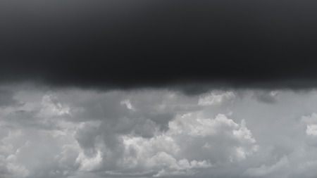 Dark storm cloud layer with cloudscape layerの写真素材