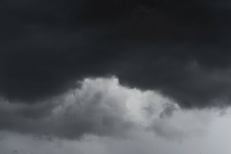Dramatic dark sky and  black cloudsの写真素材