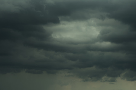 Dramatic dark storm cloud and rainyの写真素材