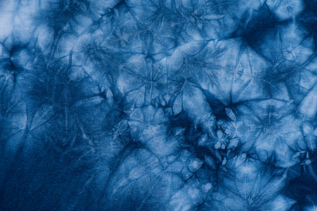 Pattern of Indigo batik dye on cotton cloth, Dye indigo fabric backgrond and textureの写真素材