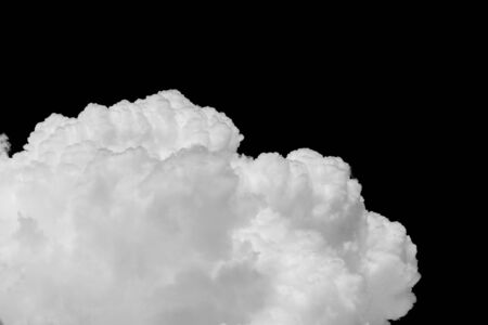 Closeup cumulus cloud isolated on black backgroundの写真素材