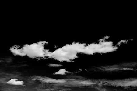 White cloud on black backgroundの写真素材