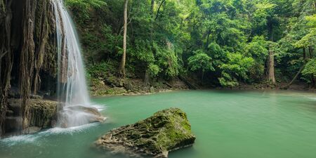 Beautiful and Breathtaking green waterfall, Erawan's waterfall, Located Kanchanaburi Province, Thailandの写真素材
