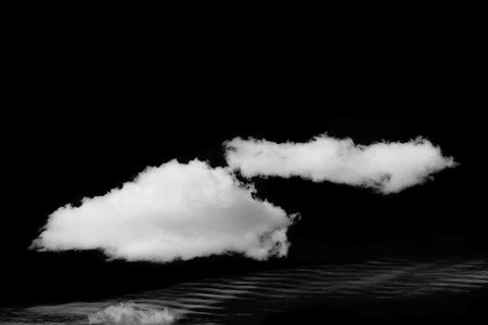 Beautiful white cloud isolated on black backgroundの写真素材