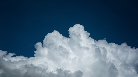 Closeup cumulus cloud with blue sky, Convectional and veretical cloudsの写真素材