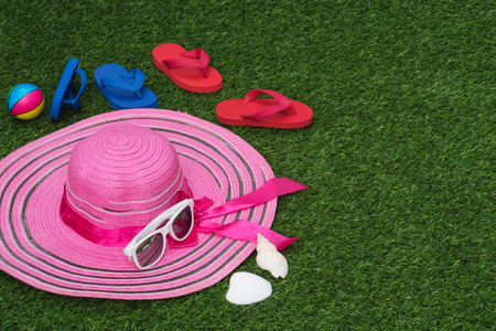 Set of summer object on green grass for backgroundの写真素材